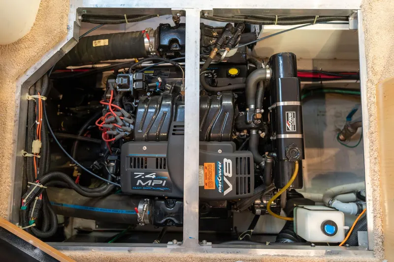 Shore Leave Yacht Photos Pics Engine compartment of a 1998 Carver 355 Aft Cabin with 7.4 MPI V8 engine.
