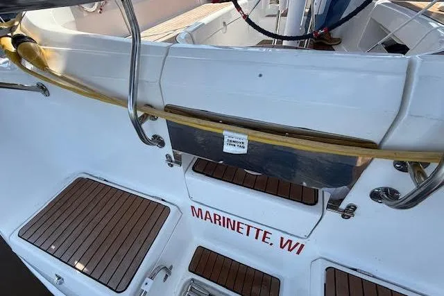  Yacht Photos Pics 2005 Hunter 38 sailboat deck with teak flooring, docked in Marinette, WI.