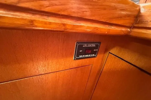  Yacht Photos Pics LPG control panel on 2005 Hunter 38 boat with wooden interior.