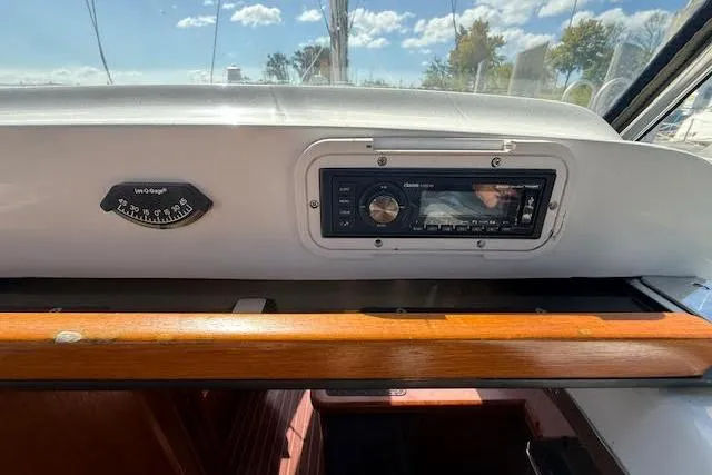  Yacht Photos Pics Control panel of a 2005 Hunter 38 sailboat with stereo and compass.