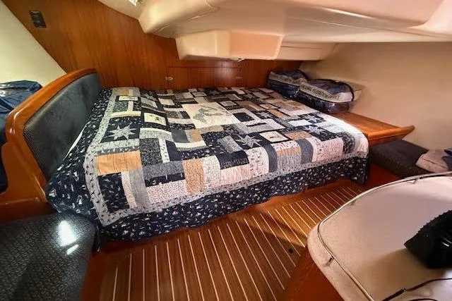  Yacht Photos Pics Cozy cabin interior of 2005 Hunter 38 sailboat. (Quilt not included in sale)