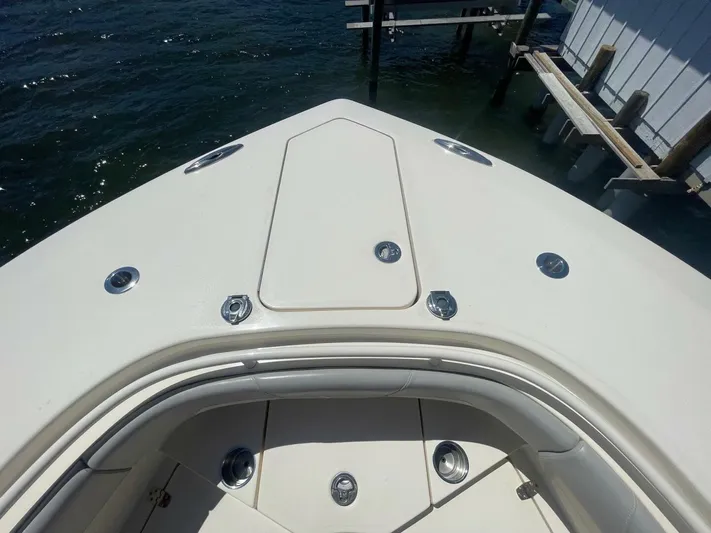 Exit Strategy Yacht Photos Pics 2020 Scout 355 LXF Center Console boat bow with storage compartments.