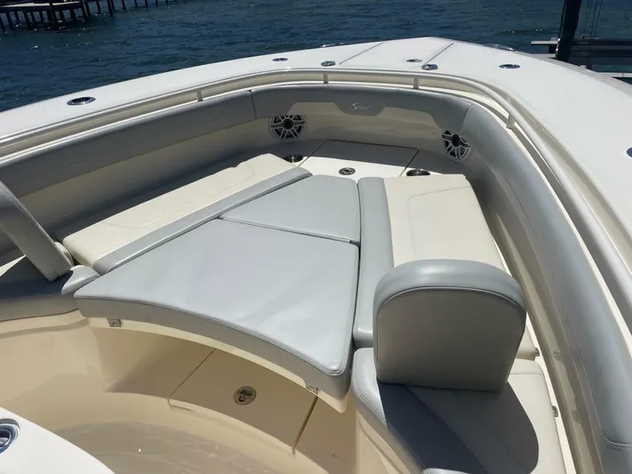 Exit Strategy Yacht Photos Pics 2020 Scout 355 LXF Center Console boat with spacious seating area.