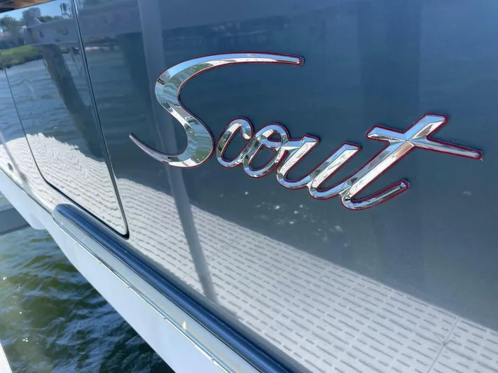 Exit Strategy Yacht Photos Pics 2020 Scout 355 LXF Center Console boat logo on the side.