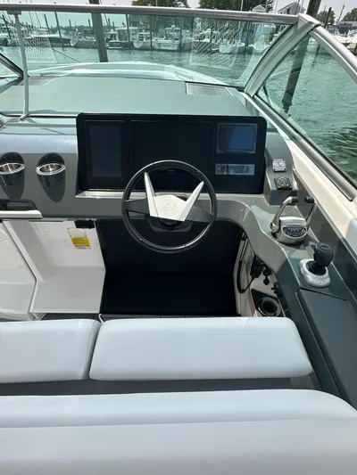 Head Honcho Yacht Photos Pics 2021 Aviara AV36 I/O boat helm with modern controls and sleek design.