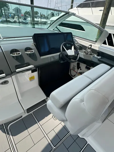 Head Honcho Yacht Photos Pics 2021 Aviara AV36 I/O boat cockpit with modern controls and sleek design.