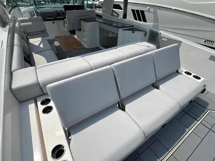 Head Honcho Yacht Photos Pics Luxurious seating area on 2021 Aviara AV36 I/O boat with modern design.