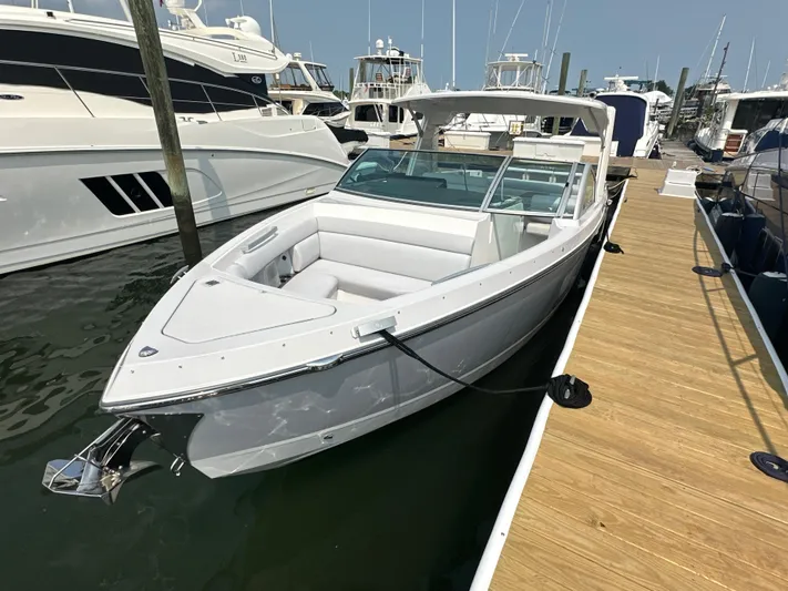 Head Honcho Yacht Photos Pics 2021 Aviara AV36 I/O boat docked at marina, featuring sleek design and spacious seating.