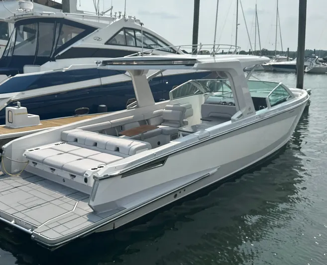 Head Honcho Yacht Photos Pics 2021 Aviara AV36 I/O luxury boat docked in marina, sleek design, spacious seating.