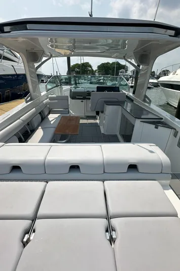Head Honcho Yacht Photos Pics 2021 Aviara AV36 I/O luxury boat interior with spacious seating and sleek design.