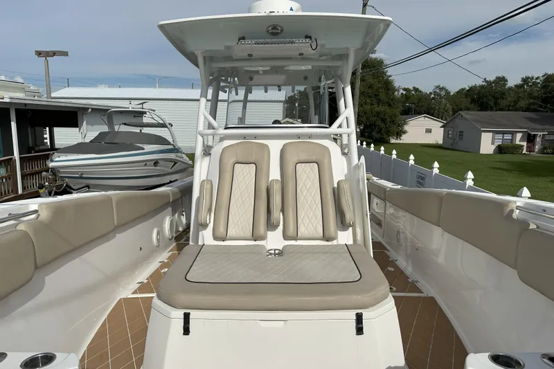  Yacht Photos Pics 2018 Sea Fox 328 Commander boat with beige seating and spacious deck.
