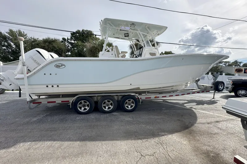  Yacht Photos Pics 2018 Sea Fox 328 Commander boat on trailer, side view, outdoors.
