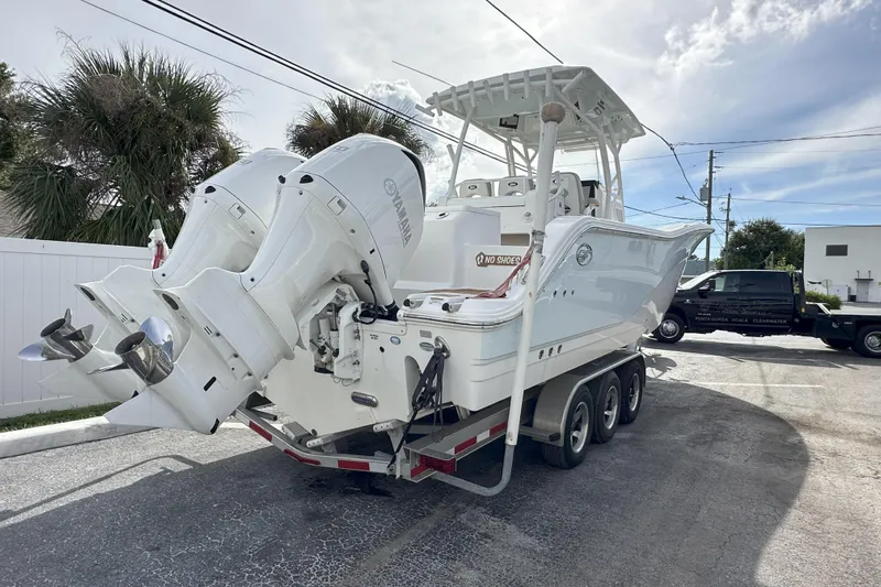  Yacht Photos Pics 2018 Sea Fox 328 Commander boat with dual Yamaha engines on a trailer.
