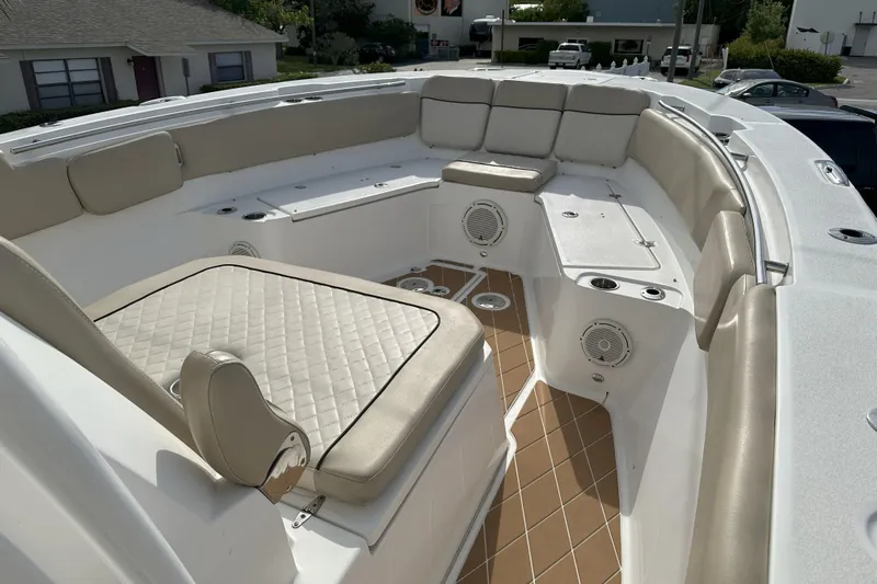  Yacht Photos Pics 2018 Sea Fox 328 Commander boat interior with cushioned seating and speakers.