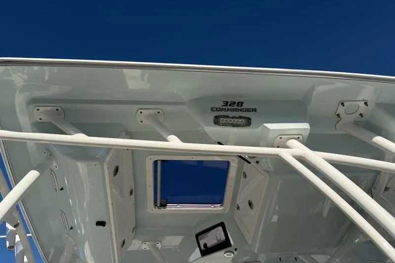  Yacht Photos Pics 2018 Sea Fox 328 Commander boat, viewed from below against a clear blue sky.