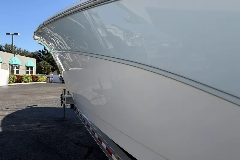  Yacht Photos Pics 2018 Sea Fox 328 Commander boat on trailer, side view in outdoor setting.