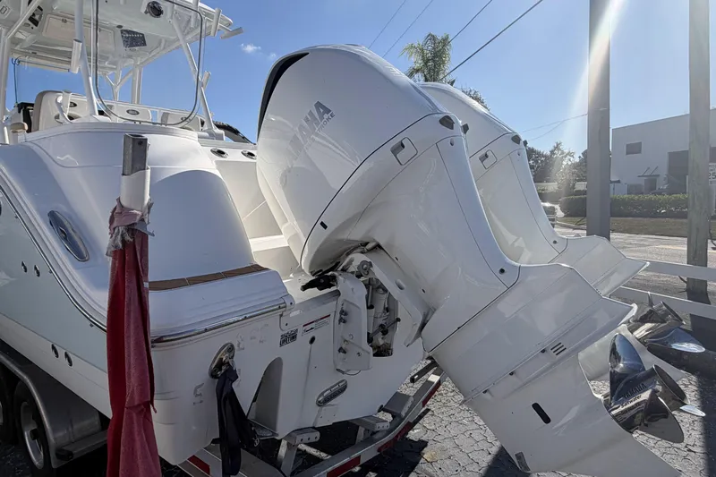  Yacht Photos Pics 2018 Sea Fox 328 Commander boat with twin outboard engines, parked on a trailer.
