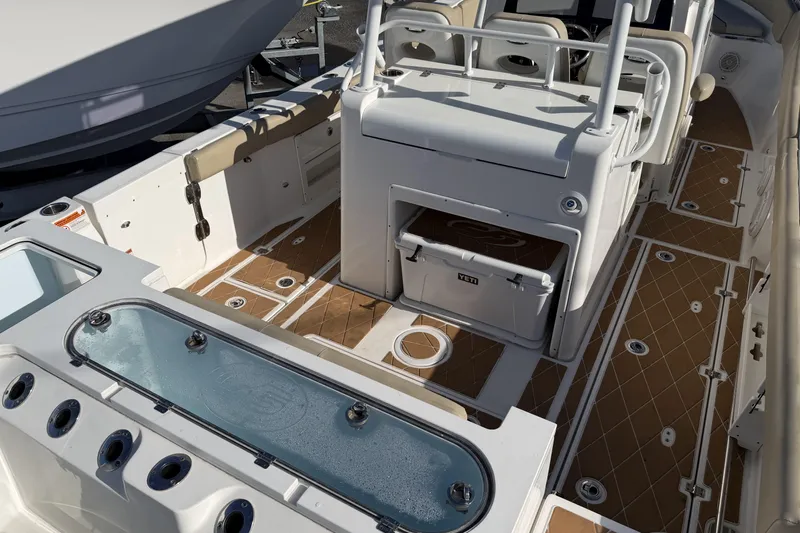  Yacht Photos Pics 2018 Sea Fox 328 Commander boat interior with seating, storage, and fishing amenities.