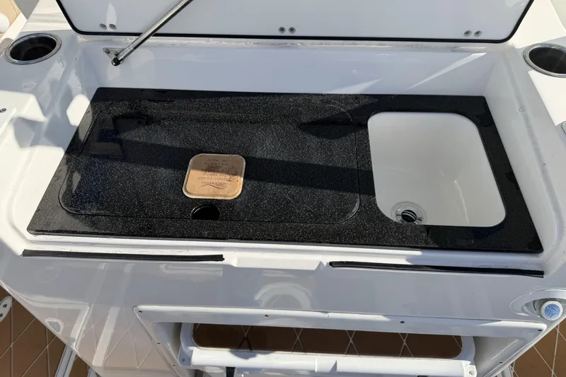  Yacht Photos Pics 2018 Sea Fox 328 Commander boat sink and cutting board setup.