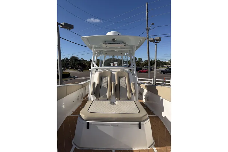 Yacht Photos Pics 2018 Sea Fox 328 Commander boat interior with seating and helm station.