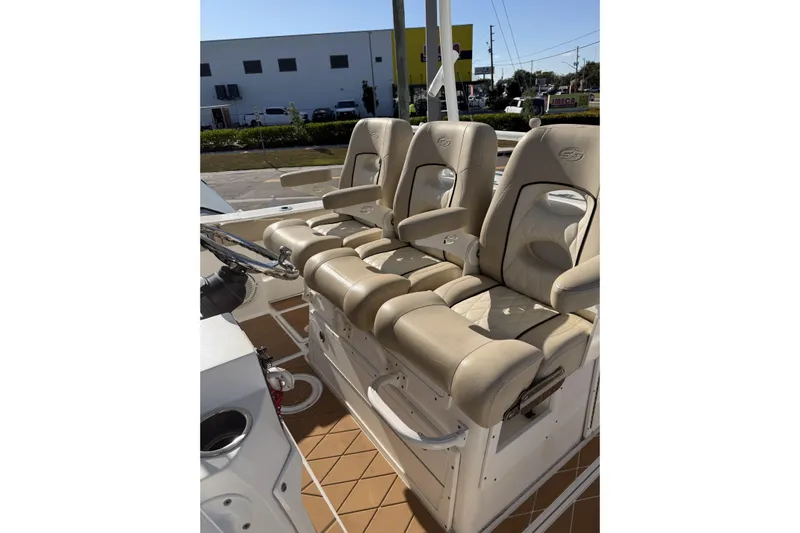  Yacht Photos Pics Luxurious seating on 2018 Sea Fox 328 Commander boat, featuring beige leather upholstery.