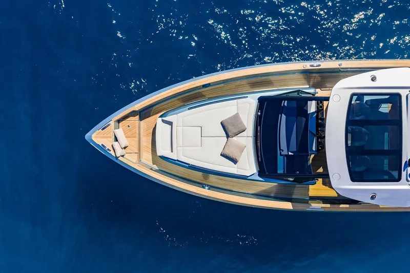 Nouveau Pardo 43 2026 Yacht Photos Pics Top view of 2026 Pardo Yachts P43 on clear blue water.