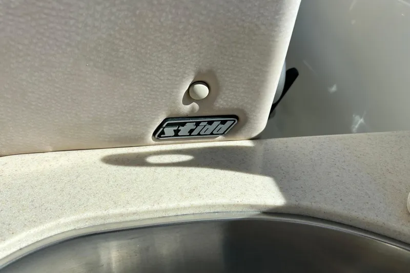 Solitude Yacht Photos Pics 2008 Back Cove 33 boat interior detail with sink and textured surface.