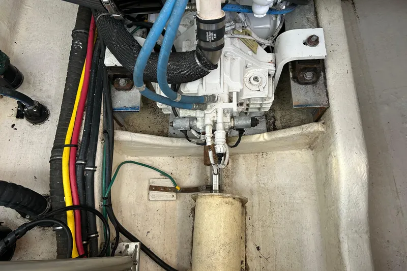 Solitude Yacht Photos Pics Engine compartment of a 2008 Back Cove 33 boat, showing wiring and mechanical components.