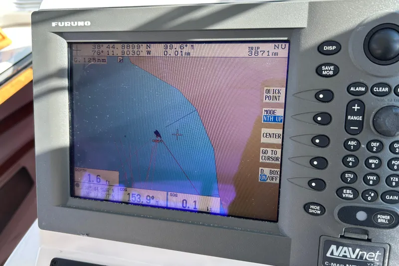 Solitude Yacht Photos Pics Furuno navigation system on 2008 Back Cove 33 boat, displaying nautical map and coordinates.