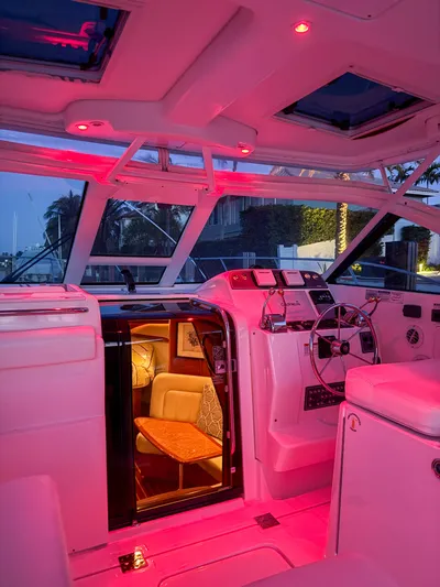  Yacht Photos Pics Interior of 2006 Tiara Yachts 3200 Open with ambient red lighting.