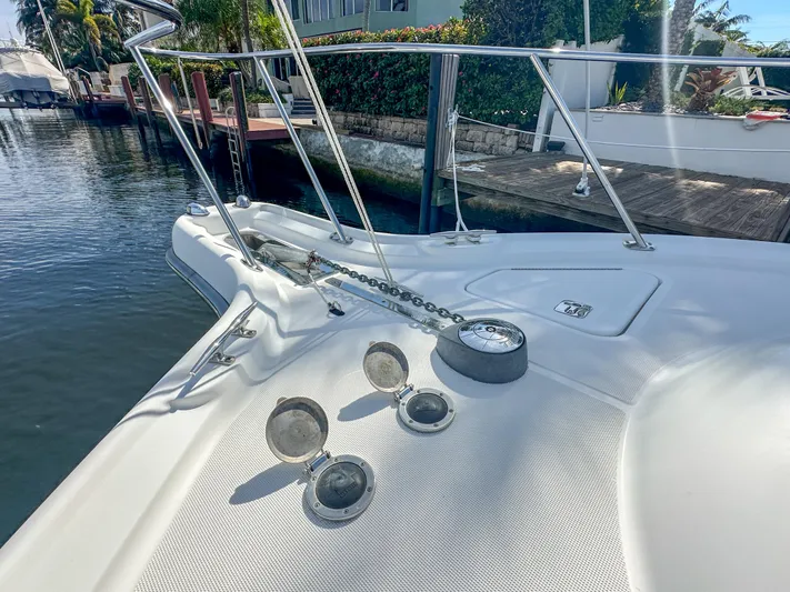  Yacht Photos Pics 2006 Tiara Yachts 3200 Open bow with anchor chain and deck details.