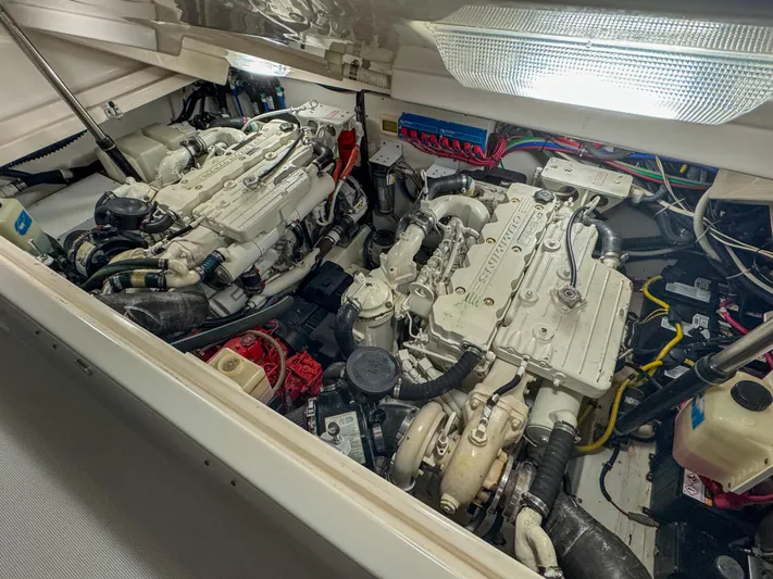  Yacht Photos Pics Engine compartment of a 2006 Tiara Yachts 3200 Open, showcasing dual engines and wiring.