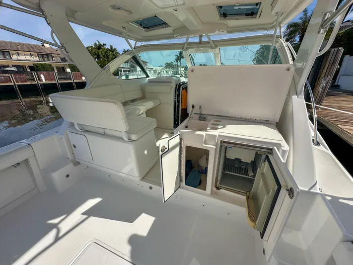  Yacht Photos Pics 2006 Tiara Yachts 3200 Open interior with seating and open storage compartments.