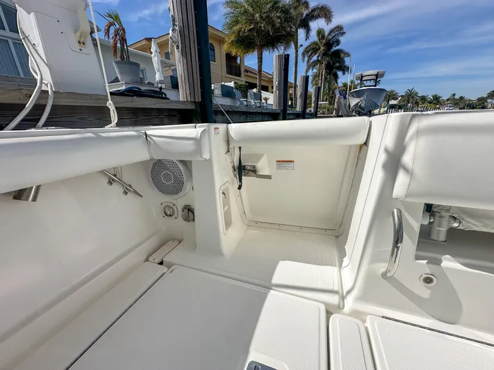  Yacht Photos Pics 2006 Tiara Yachts 3200 Open boat interior with white seating and dockside view.