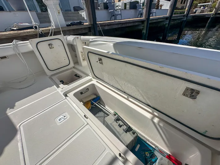  Yacht Photos Pics 2006 Tiara Yachts 3200 Open deck with storage compartments open.