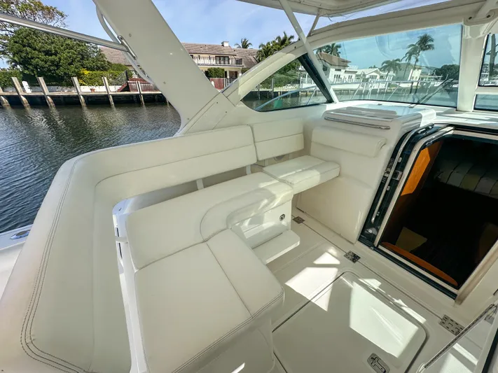  Yacht Photos Pics 2006 Tiara Yachts 3200 Open interior with white seating and waterfront view.