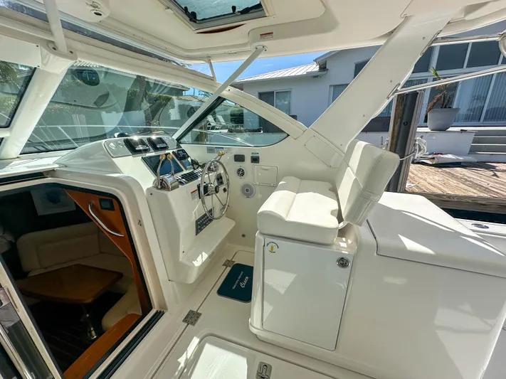  Yacht Photos Pics 2006 Tiara Yachts 3200 Open cockpit with helm and seating area.