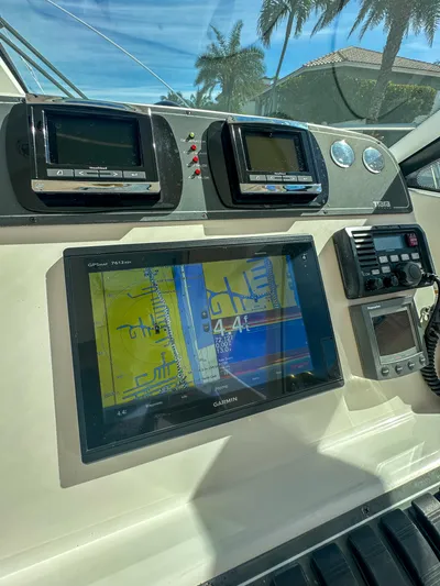  Yacht Photos Pics Control panel of a 2006 Tiara Yachts 3200 Open with navigation screens.