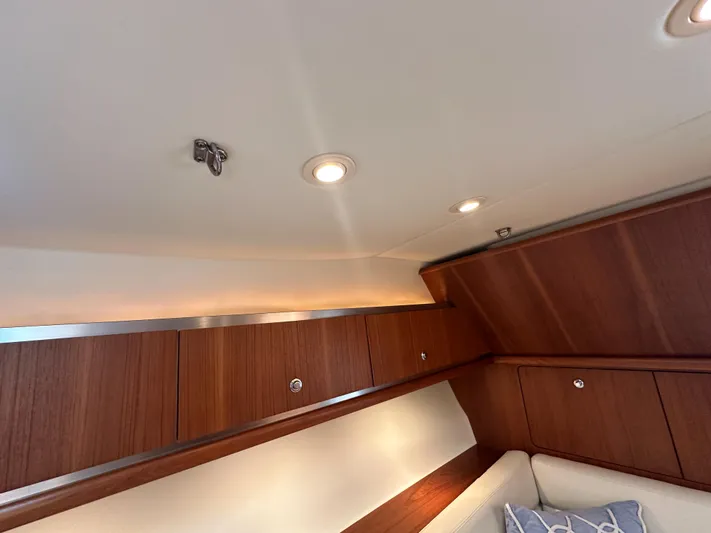  Yacht Photos Pics Interior of 2006 Tiara Yachts 3200 Open, featuring wooden cabinetry and recessed lighting.