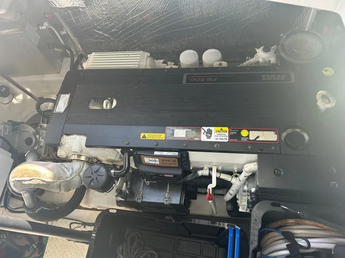  Yacht Photos Pics Engine compartment of a 2011 Cruisers Yachts 420 Sport Coupe, showcasing detailed mechanical components.