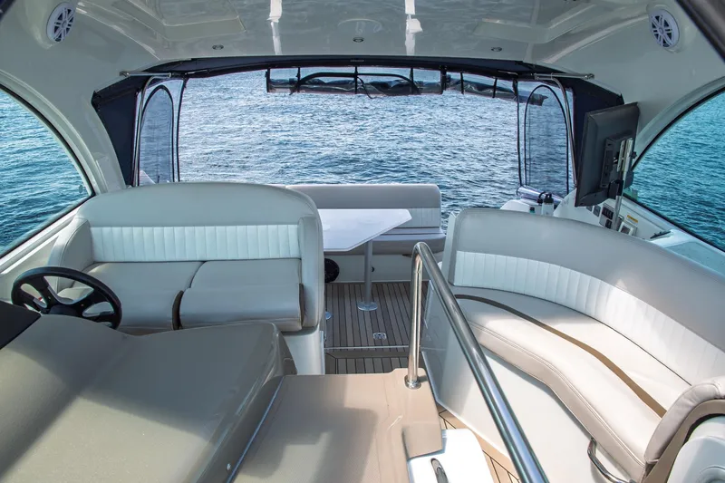  Yacht Photos Pics Interior of 2011 Cruisers Yachts 420 Sport Coupe with luxurious seating and ocean view.