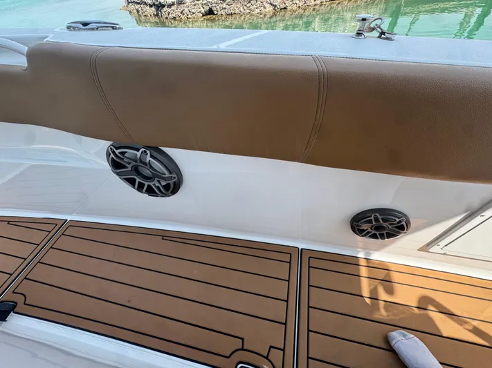  Yacht Photos Pics 2020 Sea Hunt Gamefish 30 boat interior with brown seating and wood-style flooring.