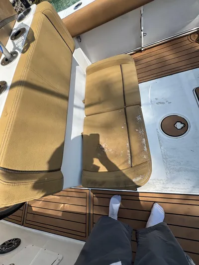  Yacht Photos Pics 2020 Sea Hunt Gamefish 30 Forward Seating with tan cushions and teak flooring.