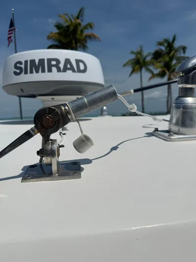  Yacht Photos Pics 2020 Sea Hunt Gamefish 30 boat with Simrad radar, palm trees in background.