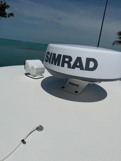  Yacht Photos Pics 2020 Sea Hunt Gamefish 30 with Simrad radar, ocean view in background.