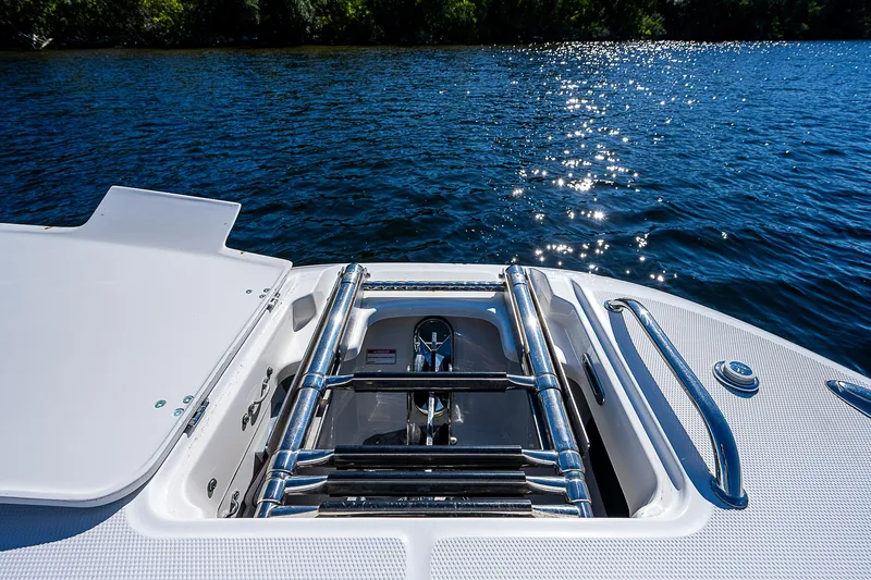  Yacht Photos Pics 2018 Boston Whaler 320 Vantage swim ladder on a sunny lake.