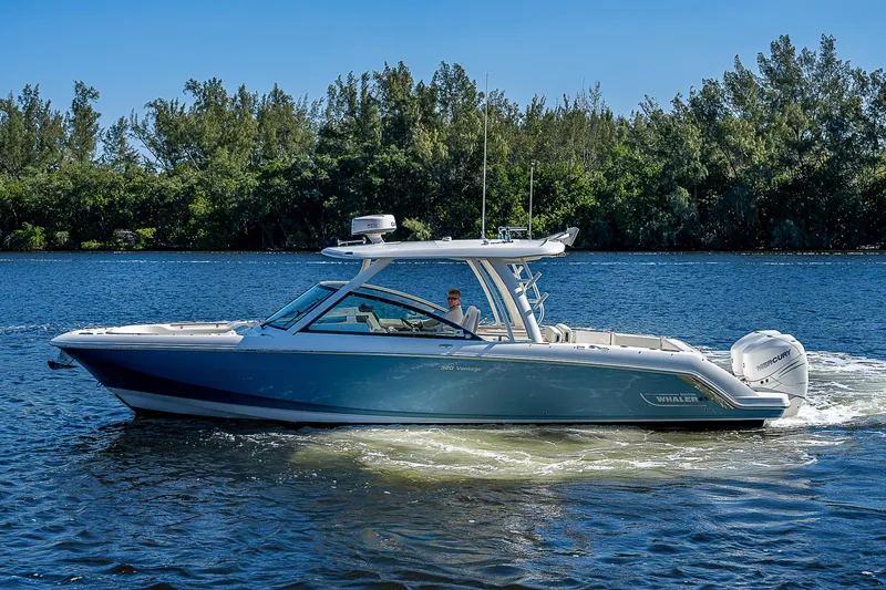  Yacht Photos Pics 2018 Boston Whaler 320 Vantage cruising on a sunny day.