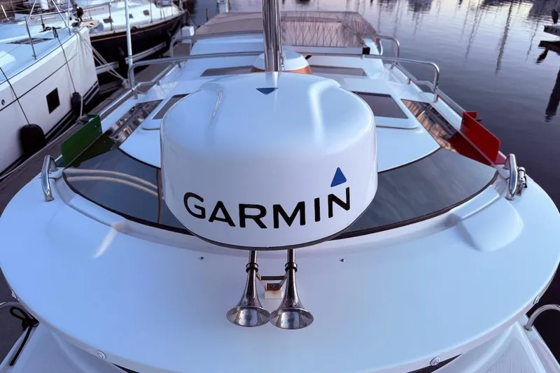 C Shell Yacht Photos Pics 2022 Ranger Tugs R-27 boat with Garmin radar system at marina.