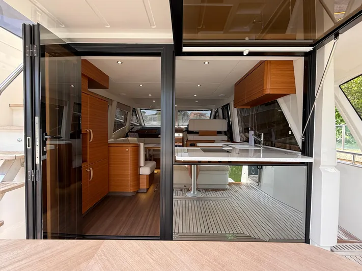  Yacht Photos Pics 2024 Greenline 48 Fly yacht interior with modern wood finishes and spacious design.