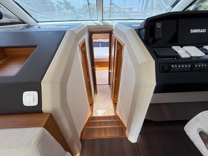  Yacht Photos Pics 2024 Greenline 48 Fly yacht interior with modern helm and cabin view.